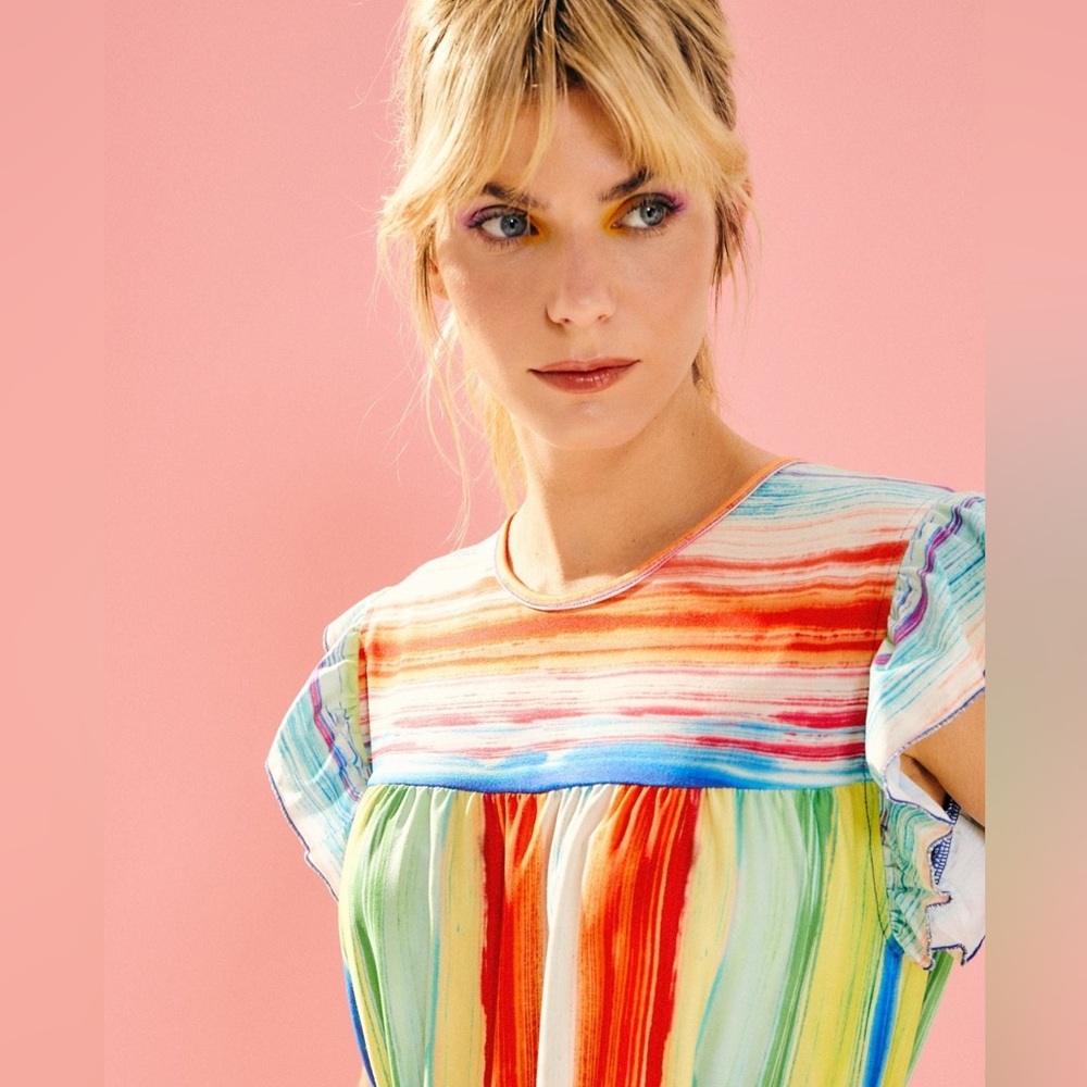 original dress, with a multi-striped print with a gradient effects.